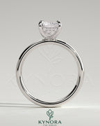 Kynora CJ 2ct radiant cut diamond claw solitaire engagement ring with cigar band and hidden halo, crafted in elegant jewelry style.