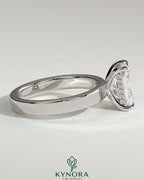 Kynora CJ 2ct radiant claw solitaire engagement ring with flat cigar band and hidden halo, showcasing sparkling diamond details.