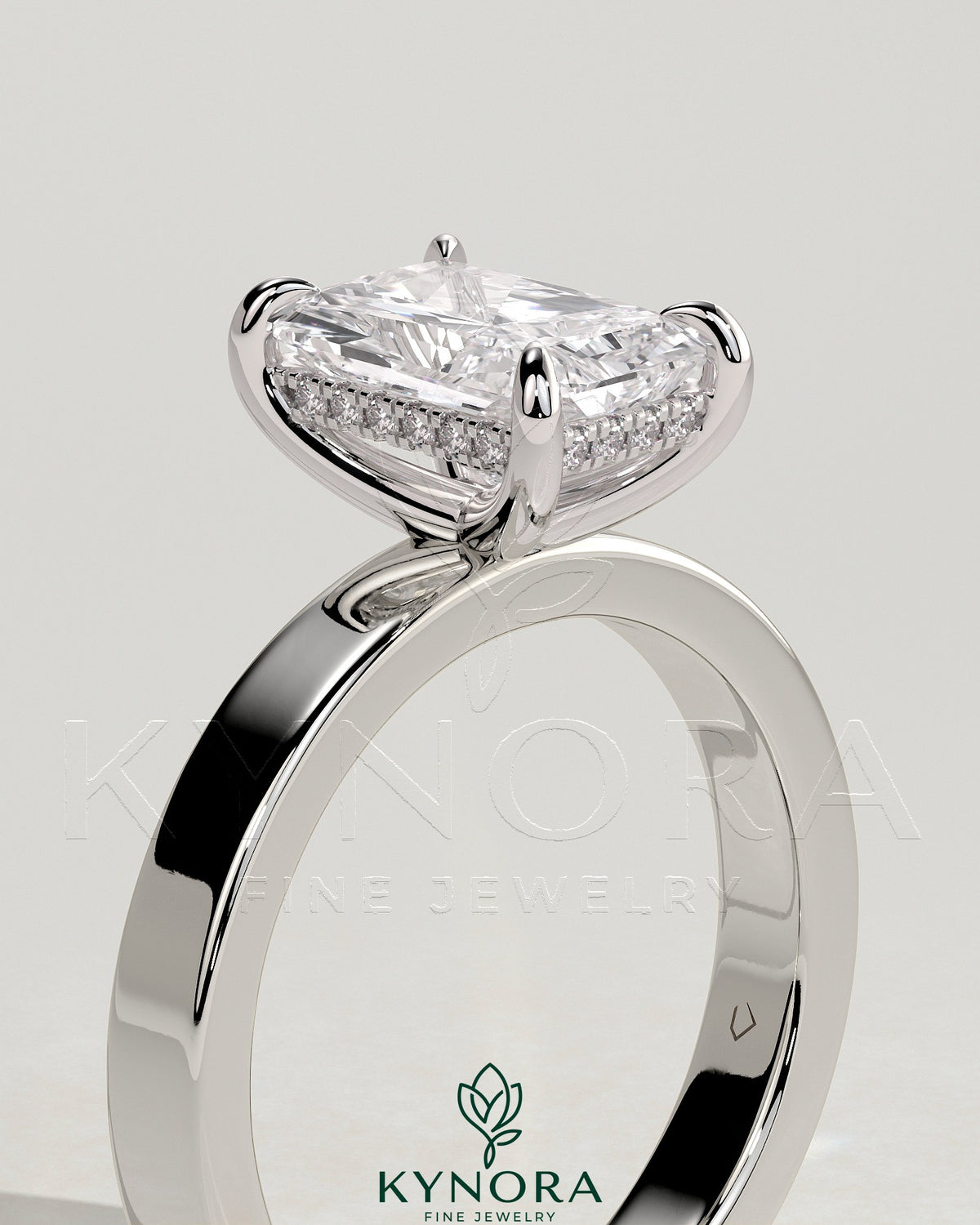 Kynora CJ 2ct radiant diamond claw solitaire engagement ring with flat cigar band and hidden halo design.