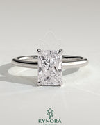 Kynora CJ 2ct radiant diamond solitaire engagement ring with hidden halo and cathedral high setting, elegant jewelry design.