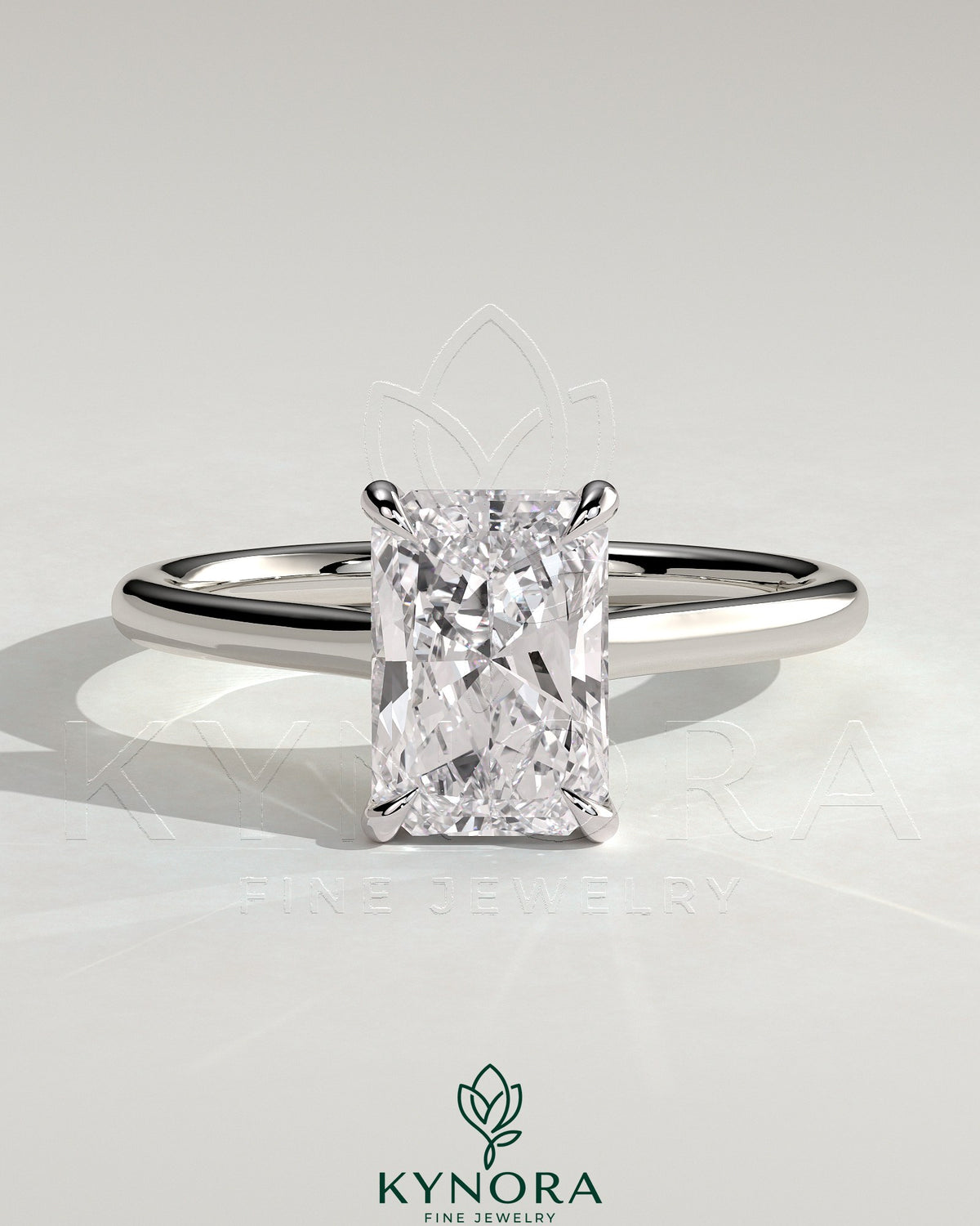 Kynora CJ 2ct radiant diamond solitaire engagement ring with hidden halo and cathedral high setting, elegant jewelry design.