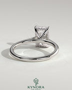 Kynora CJ 2ct radiant diamond solitaire engagement ring with hidden halo and cathedral high setting, showcasing intricate craftsmanship.