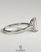 Kynora CJ 2ct radiant diamond solitaire engagement ring with hidden halo and cathedral high setting, showcasing intricate design.