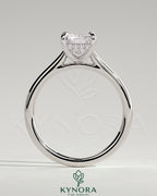 Kynora CJ 2ct radiant claw solitaire engagement ring with hidden halo and cathedral high setting, showcasing intricate diamond details.