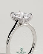 Kynora CJ 2ct radiant diamond claw solitaire engagement ring with hidden halo and cathedral high setting.