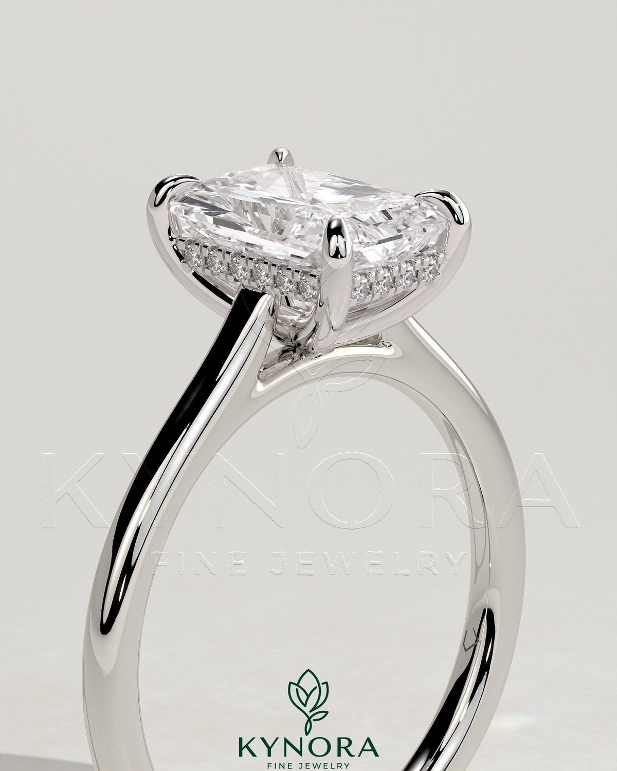 Kynora CJ 2ct radiant diamond claw solitaire engagement ring with hidden halo and cathedral high setting.