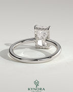 Kynora CJ 2ct radiant claw solitaire engagement ring with hidden halo and floating cathedral low setting, showcasing the detailed design.