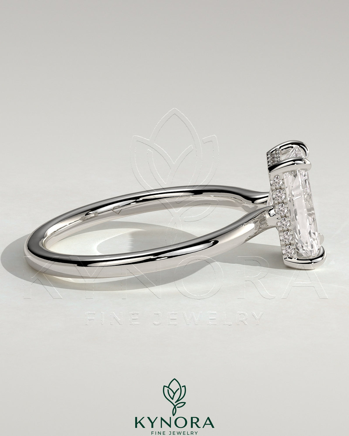 Kynora CJ 2ct radiant diamond claw solitaire engagement ring with hidden halo and floating cathedral low setting.