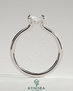 Kynora CJ 2ct radiant claw solitaire engagement ring with hidden halo and floating cathedral low setting, showcasing sparkling diamond.