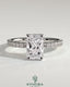 Kynora CJ 2ct radiant claw solitaire engagement ring with hidden halo and pave band, featuring a sparkling central diamond.