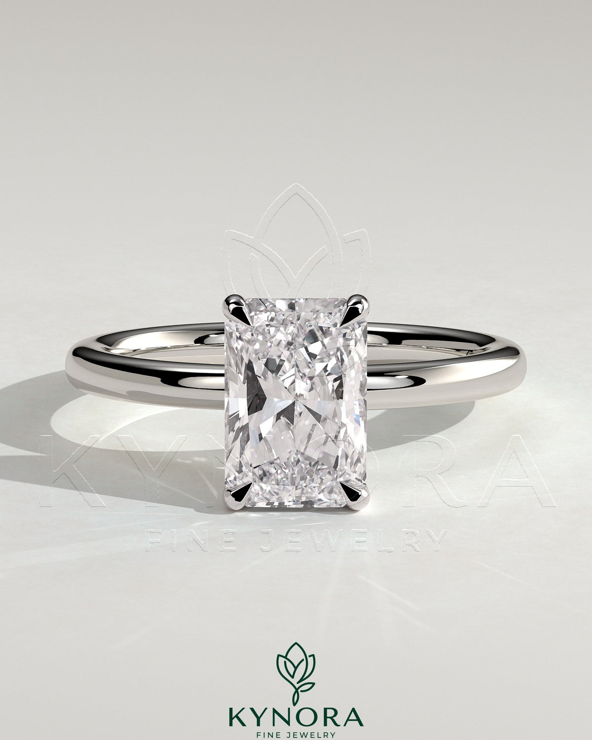 Kynora CJ 2ct radiant cut solitaire engagement ring with hidden halo and claw setting, featuring sparkling diamond details.