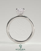 Kynora CJ 2ct radiant claw solitaire engagement ring with hidden halo, featuring a sparkling central diamond and elegant band.