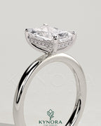 Kynora CJ 2ct Radiant Claw Solitaire Engagement Ring with Hidden Halo, featuring a sparkling central gemstone and elegant band.