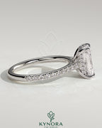 Kynora CJ 2ct radiant diamond solitaire engagement ring with hidden halo, pave band, and cathedral high setting.