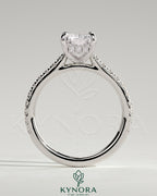 Kynora CJ 2ct radiant diamond solitaire engagement ring with hidden halo, pave band, and cathedral high setting.