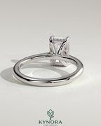 Kynora CJ 2ct radiant claw solitaire engagement ring with hidden halo, tapered band, cathedral high setting, elegant jewelry piece