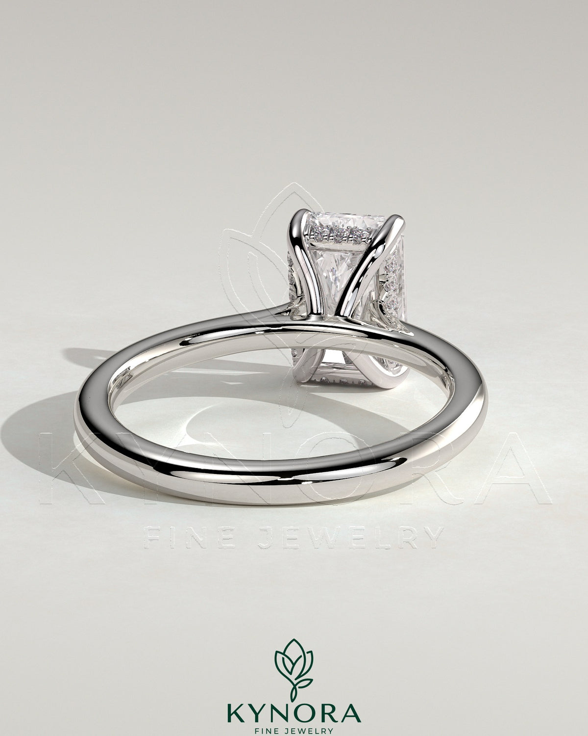 Kynora CJ 2ct radiant claw solitaire engagement ring with hidden halo, tapered band, cathedral high setting, elegant jewelry piece