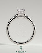 Kynora CJ 2ct radiant diamond claw solitaire engagement ring with hidden halo, tapered band, and cathedral high setting.