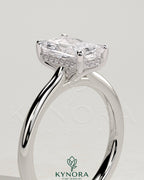Kynora CJ 2ct radiant diamond solitaire engagement ring with hidden halo, tapered band, and cathedral high setting.