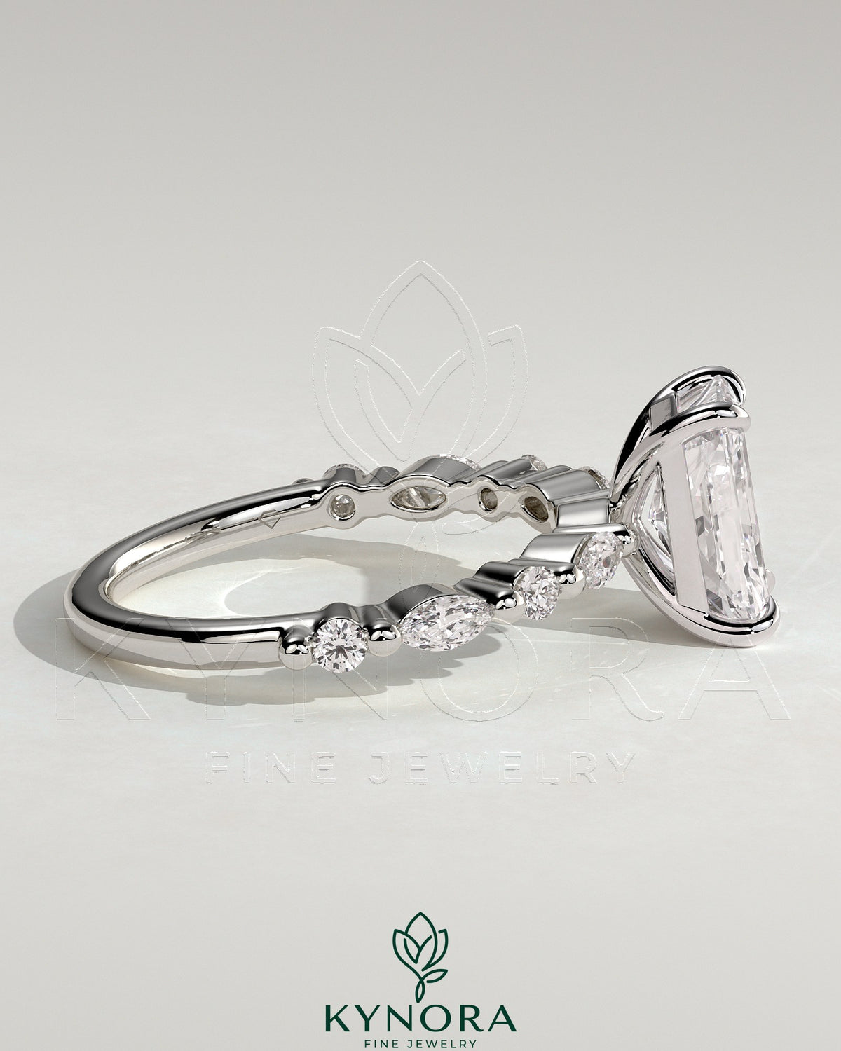 Kynora CJ 2ct radiant claw solitaire engagement ring with marquise and round accent stones on a silver band