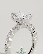 Kynora CJ 2ct radiant diamond claw solitaire engagement ring with marquise and round accent stones, elegant jewelry design