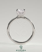 Kynora CJ 2ct radiant claw solitaire engagement ring with petal gallery, leaf accents, and cathedral setting.