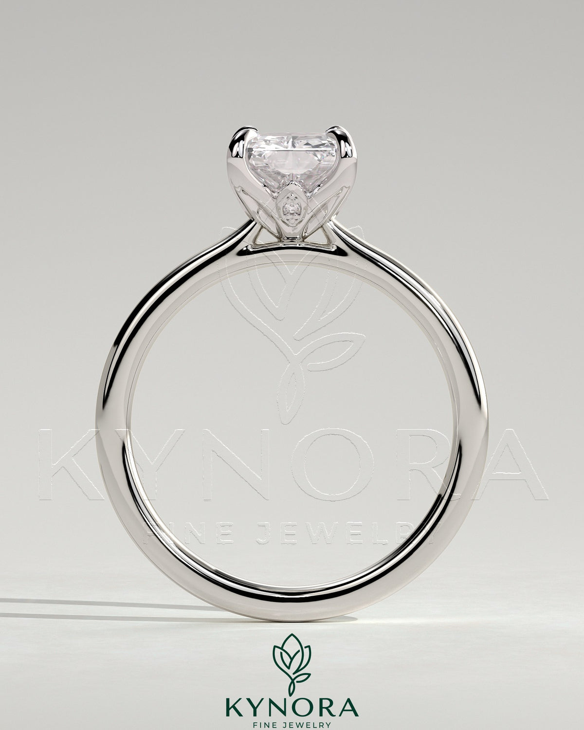 Kynora CJ 2ct radiant claw solitaire engagement ring with petal gallery, leaf accents, and cathedral setting.