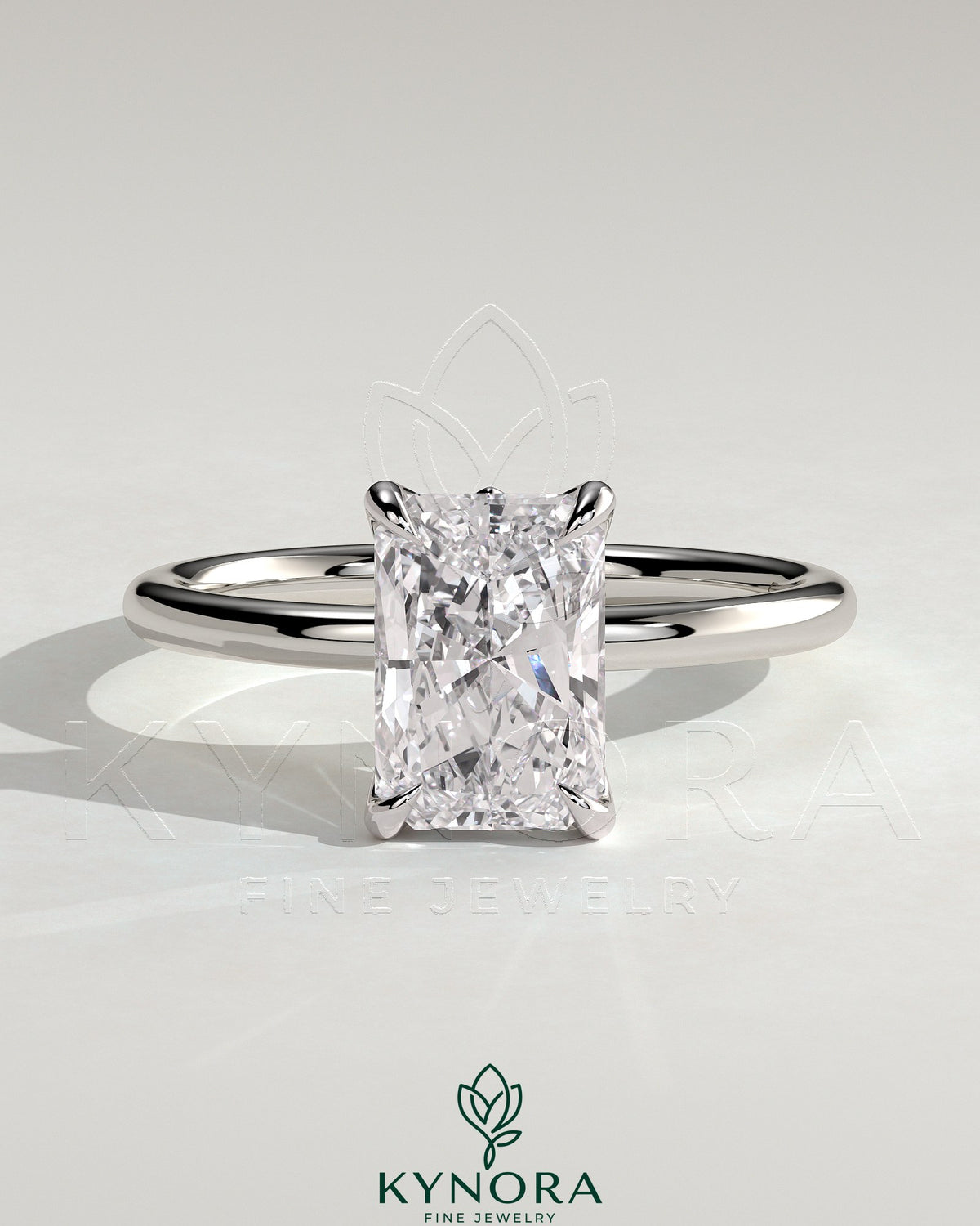 Kynora CJ 2ct radiant claw solitaire engagement ring with petal gallery and leaf accents, crafted in elegant jewelry design