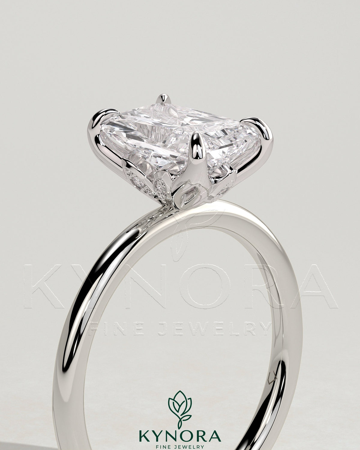 Kynora CJ 2ct radiant claw solitaire engagement ring with petal gallery and leaf accents in sterling silver.