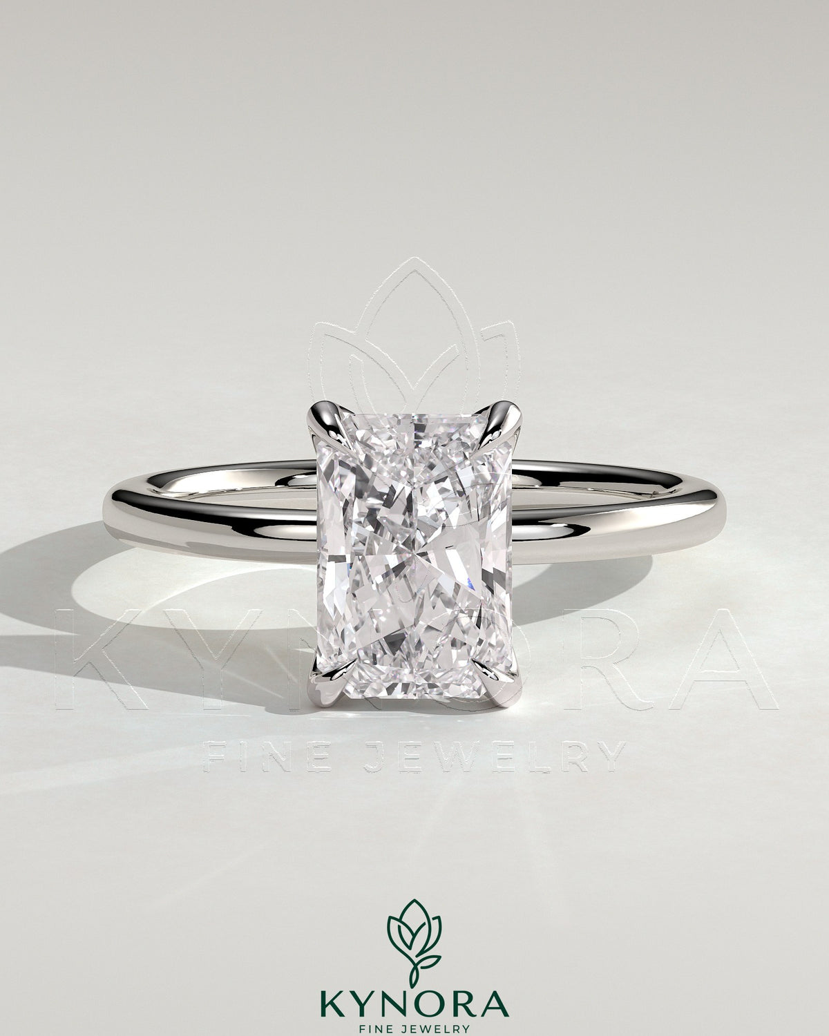 Kynora CJ 2ct radiant claw solitaire engagement ring with petal gallery and accented tiara detail, showcasing intricate design and diamond setting.