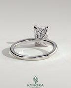 Kynora CJ 2ct radiant claw solitaire engagement ring with petal gallery and accented tiara detail, showcasing intricate design.