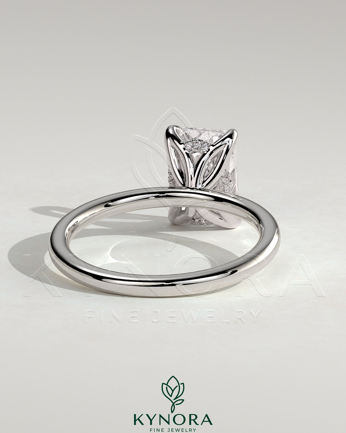 Kynora CJ 2ct radiant claw solitaire engagement ring with petal gallery and accented tiara detail, showcasing intricate design.