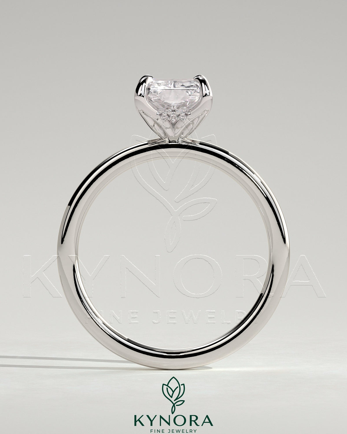 Kynora CJ 2ct radiant claw solitaire engagement ring with petal gallery and accented tiara detail in sterling silver.