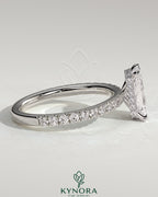 Kynora CJ 2ct radiant diamond claw solitaire engagement ring with wrap-around hidden halo and pave band, elegant and sparkling.