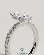 Kynora CJ 2ct radiant diamond claw solitaire engagement ring with hidden halo and pave band, crafted in elegant gold.