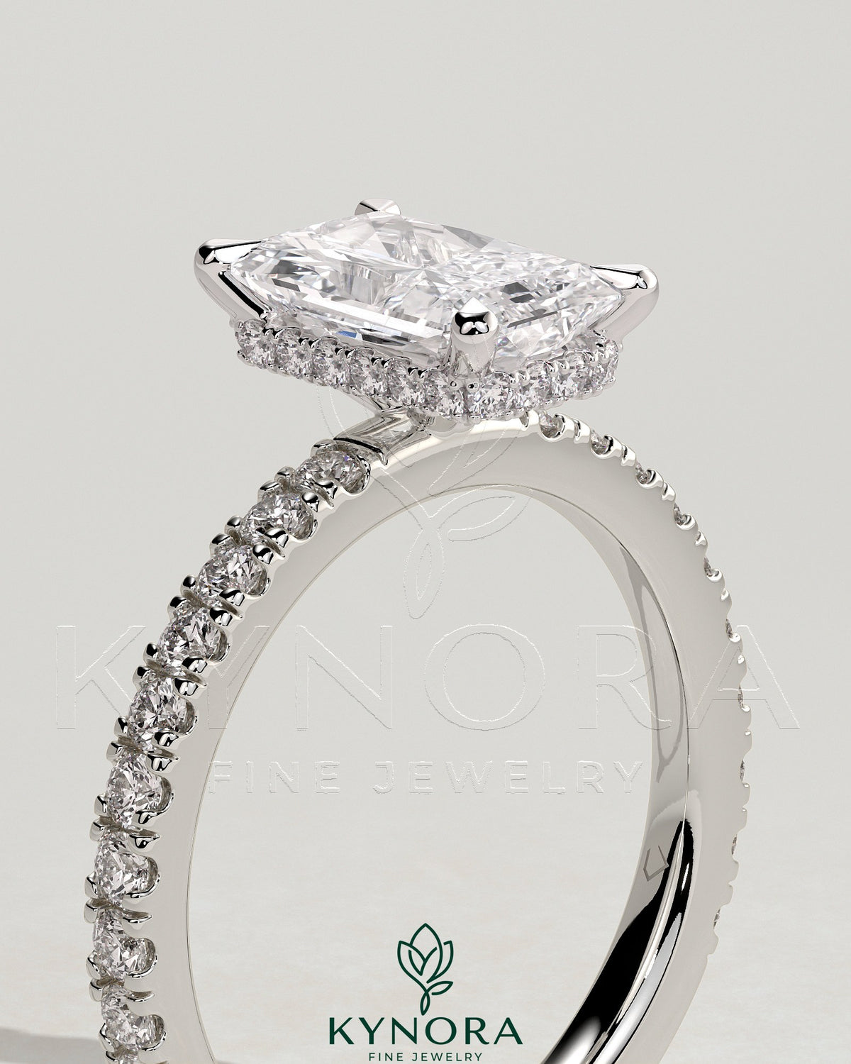 Kynora CJ 2ct radiant diamond claw solitaire engagement ring with hidden halo and pave band, crafted in elegant gold.
