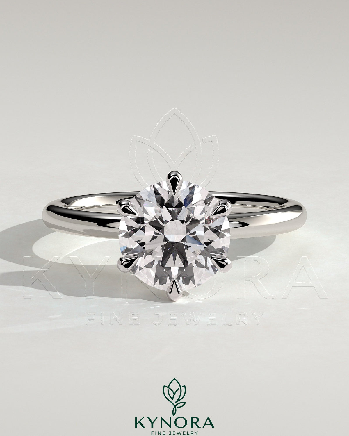 Kynora CJ 2ct round claw solitaire engagement ring featuring a sparkling central diamond and sleek band design. Main image