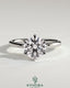 Kynora CJ 2ct round claw solitaire engagement ring featuring a sparkling central diamond and sleek band design.