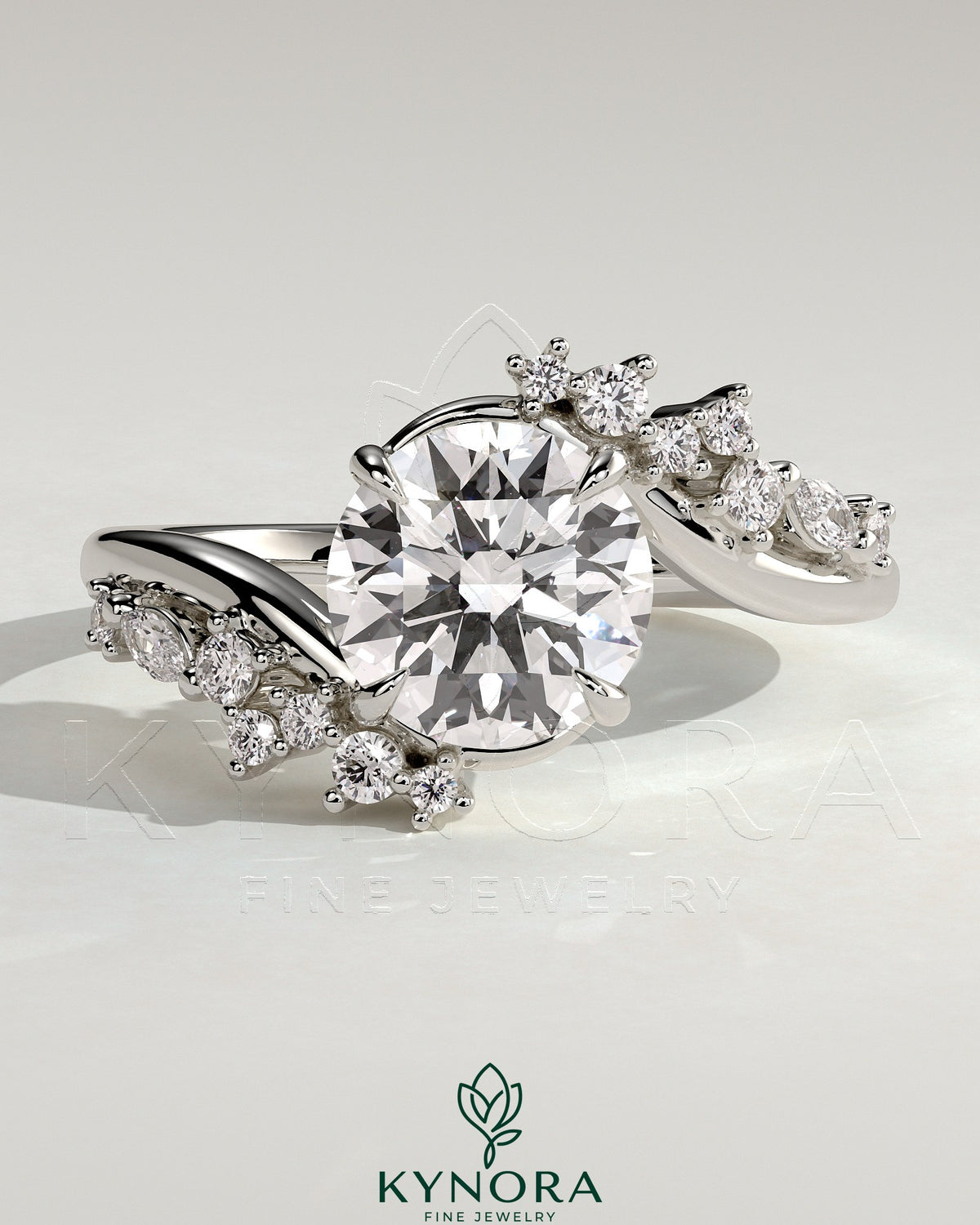 Kynora CJ 2ct round diamond solitaire engagement ring with bypass band and clustered marquise accent stones. Main image
