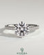 Kynora CJ 2ct round diamond solitaire engagement ring with claw setting, crown gallery, and pave band, showcasing elegant jewelry design.