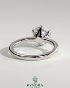 Kynora CJ 2ct round claw solitaire engagement ring with crown gallery design, featuring a sparkling center diamond.