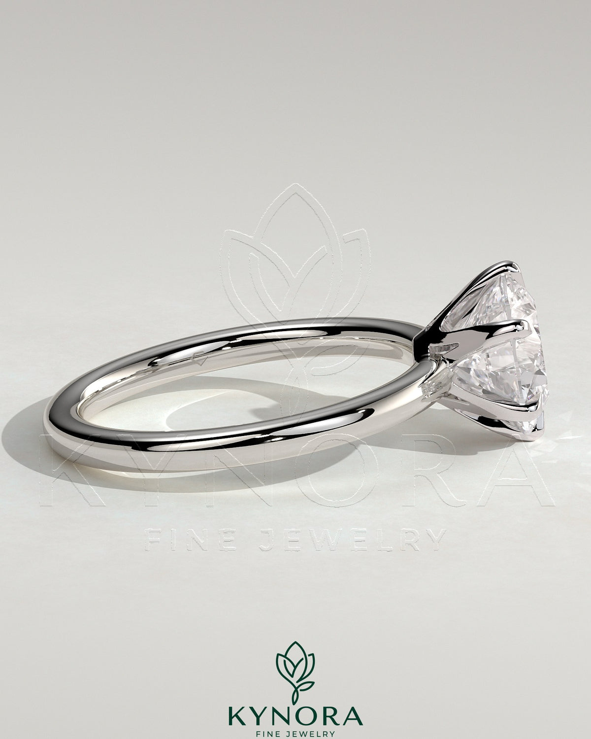 Kynora CJ 2ct round claw solitaire engagement ring with crown gallery setting, featuring a sparkling central diamond and elegant band