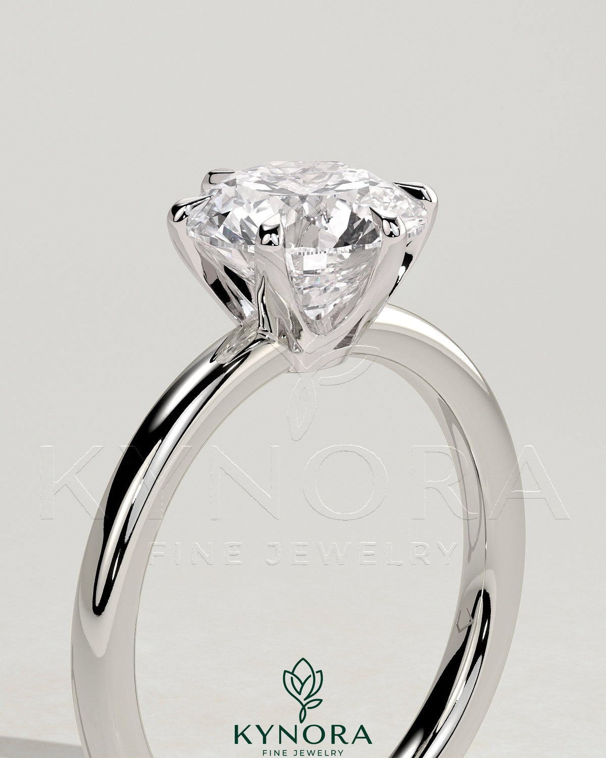 Kynora CJ 2-carat round diamond solitaire engagement ring with claw setting and crown gallery design.