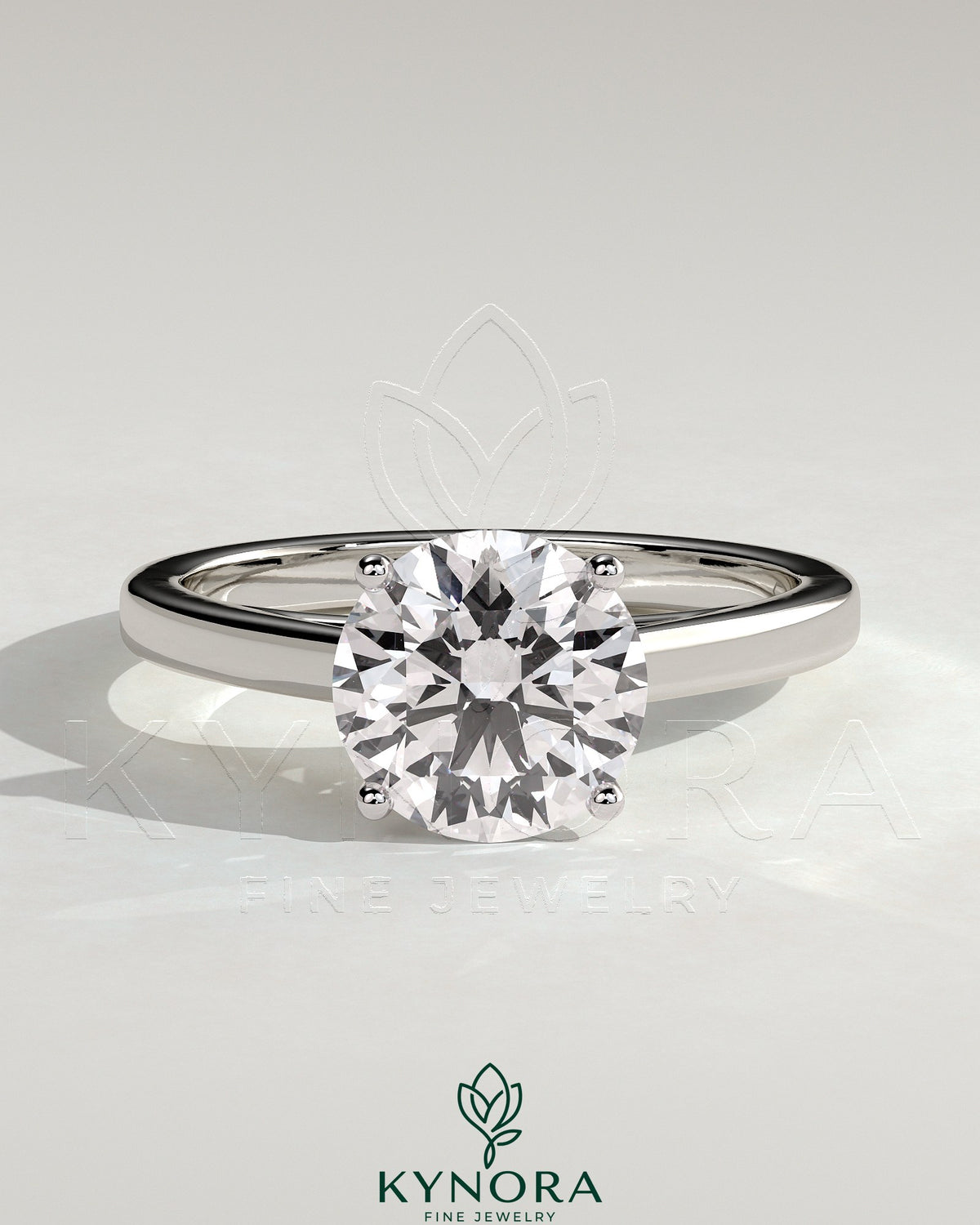 Kynora CJ 2ct round diamond claw solitaire engagement ring with flat band and cathedral high setting. Imagen principal del producto