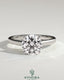 Kynora CJ 2ct round diamond claw solitaire engagement ring with flat band and cathedral high setting.