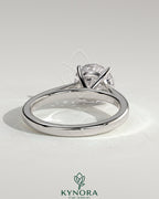 Kynora CJ 2ct round diamond claw solitaire engagement ring with flat band and cathedral high setting