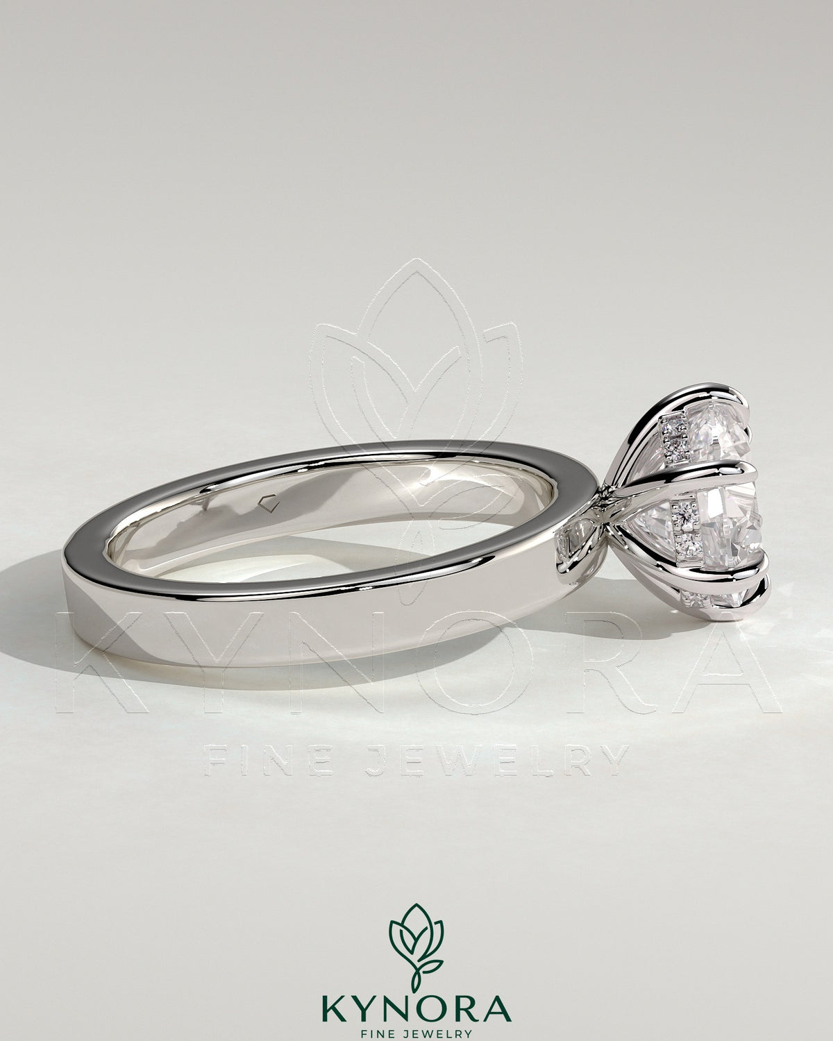 Kynora CJ 2ct round diamond solitaire engagement ring with flat cigar band and hidden halo design, showcasing sparkling diamond and elegant band.
