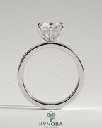 Kynora CJ 2ct round diamond claw solitaire engagement ring with flat cigar band and hidden halo design.