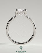 Kynora CJ 2ct round claw solitaire engagement ring with hidden halo and floating cathedral low setting, showcasing elegant jewelry design