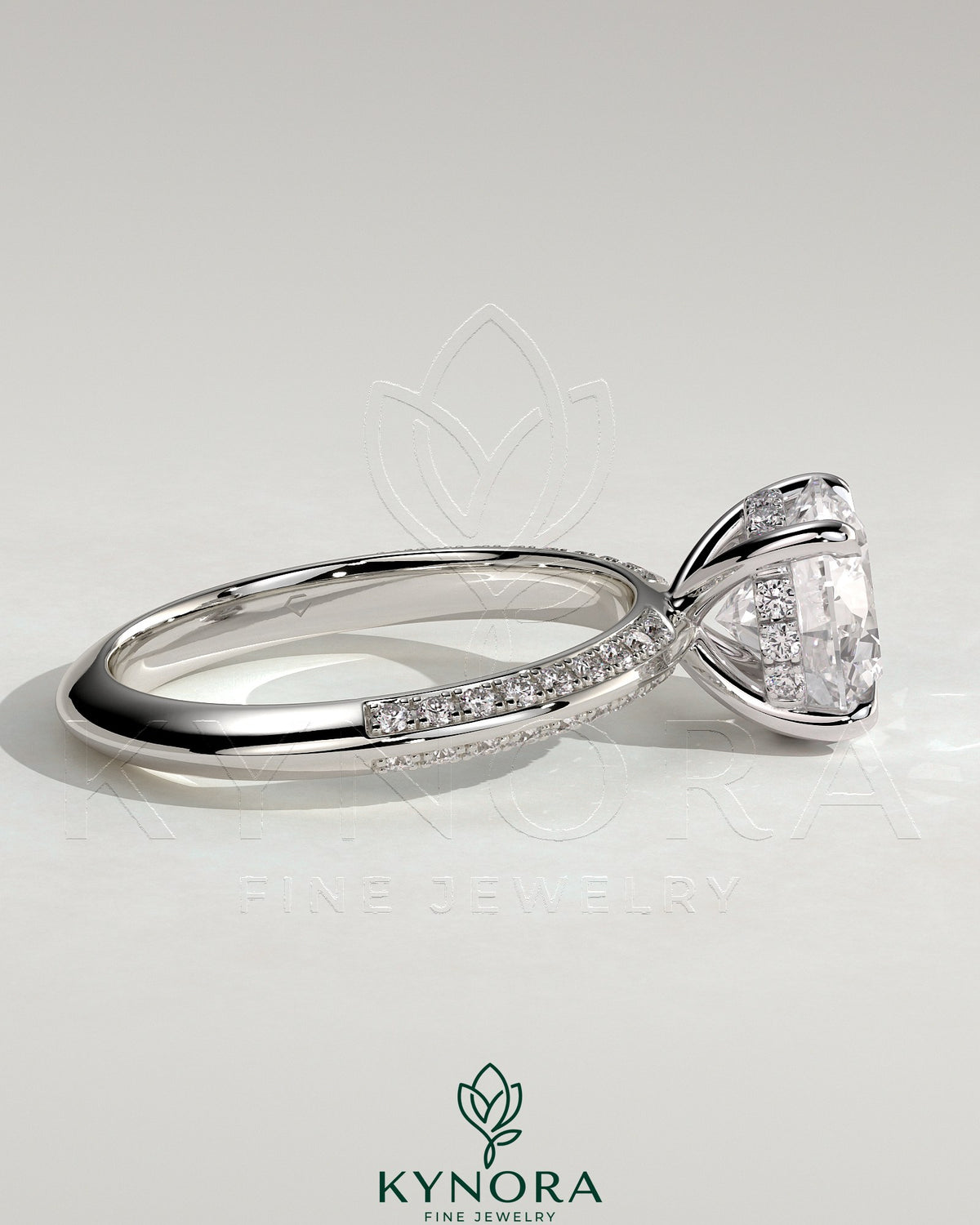 Kynora CJ 2ct round claw solitaire engagement ring with hidden halo and knife edge pave band, sterling silver jewelry.